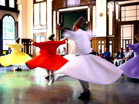 photo of sufi dancers whirling