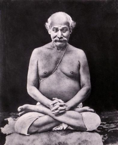 Lahiri Mahasaya sitting in lotus pose