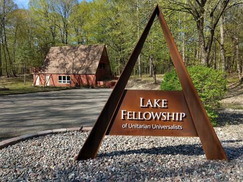 Lake Fellowship A-frame sign with the a-frame building in the background